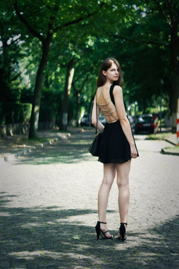 black dress with chain-straps