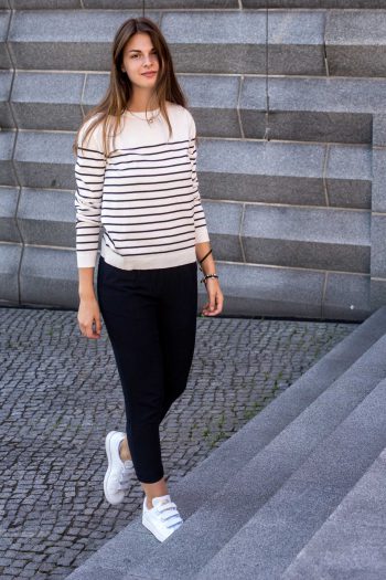 Blue pants and striped sweater