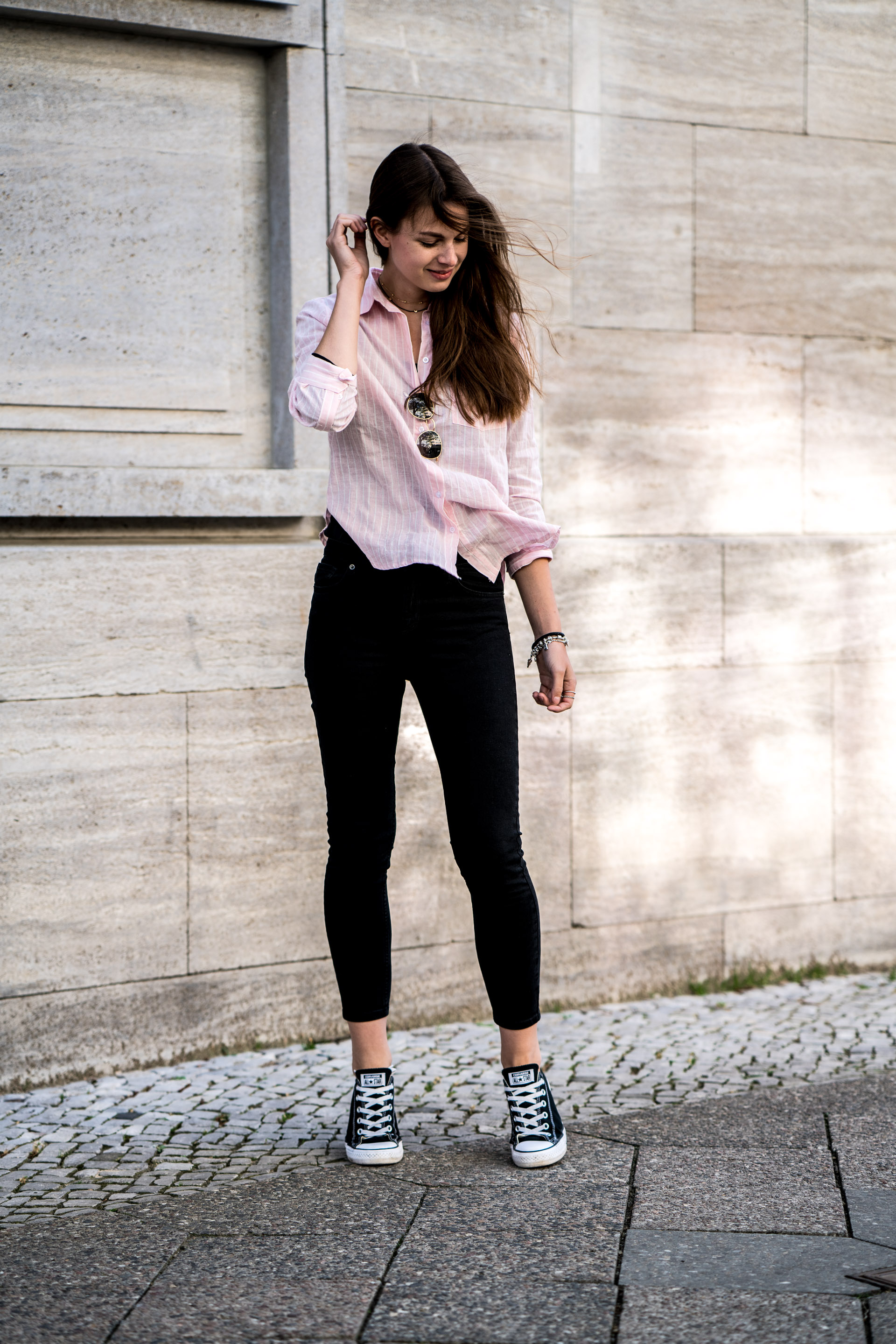 pink shirt and jeans outfit