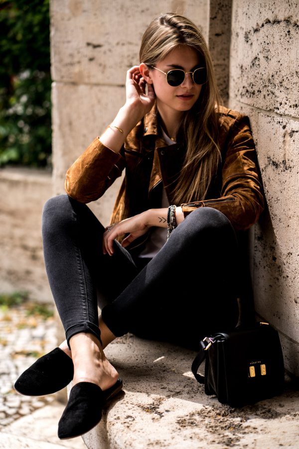 brown leather jacket with black dress