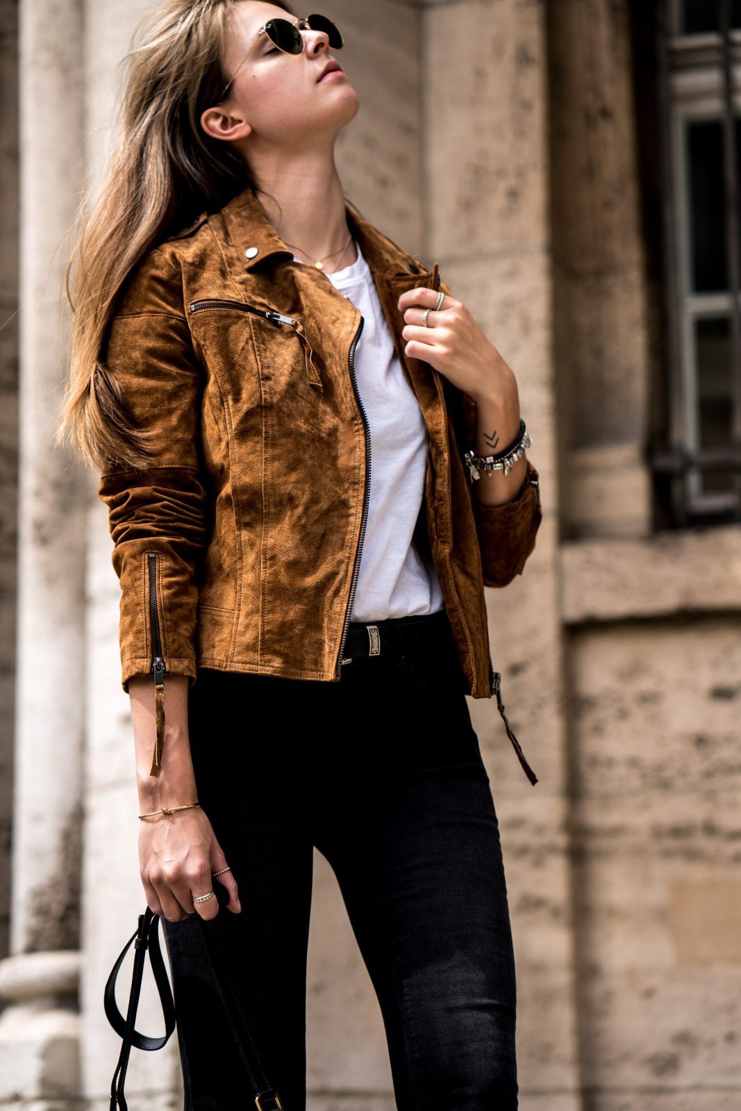 brown leather jacket with black dress