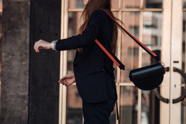 black bag with sporty strap