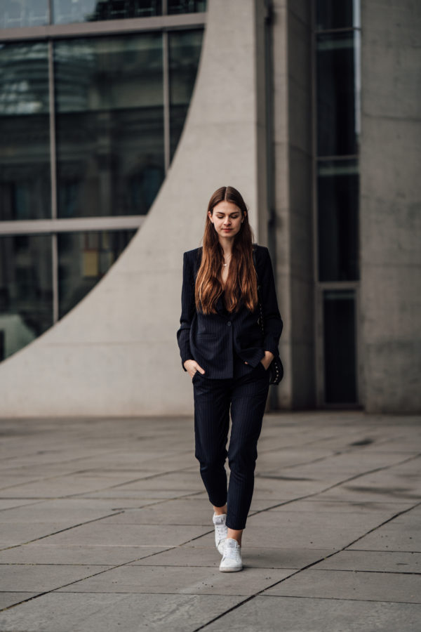 Casual Chic Outfit: Women's suit combined with sneakers