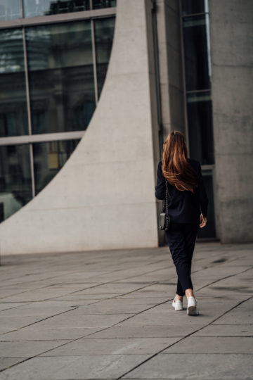 women's suit combined with Sneakers