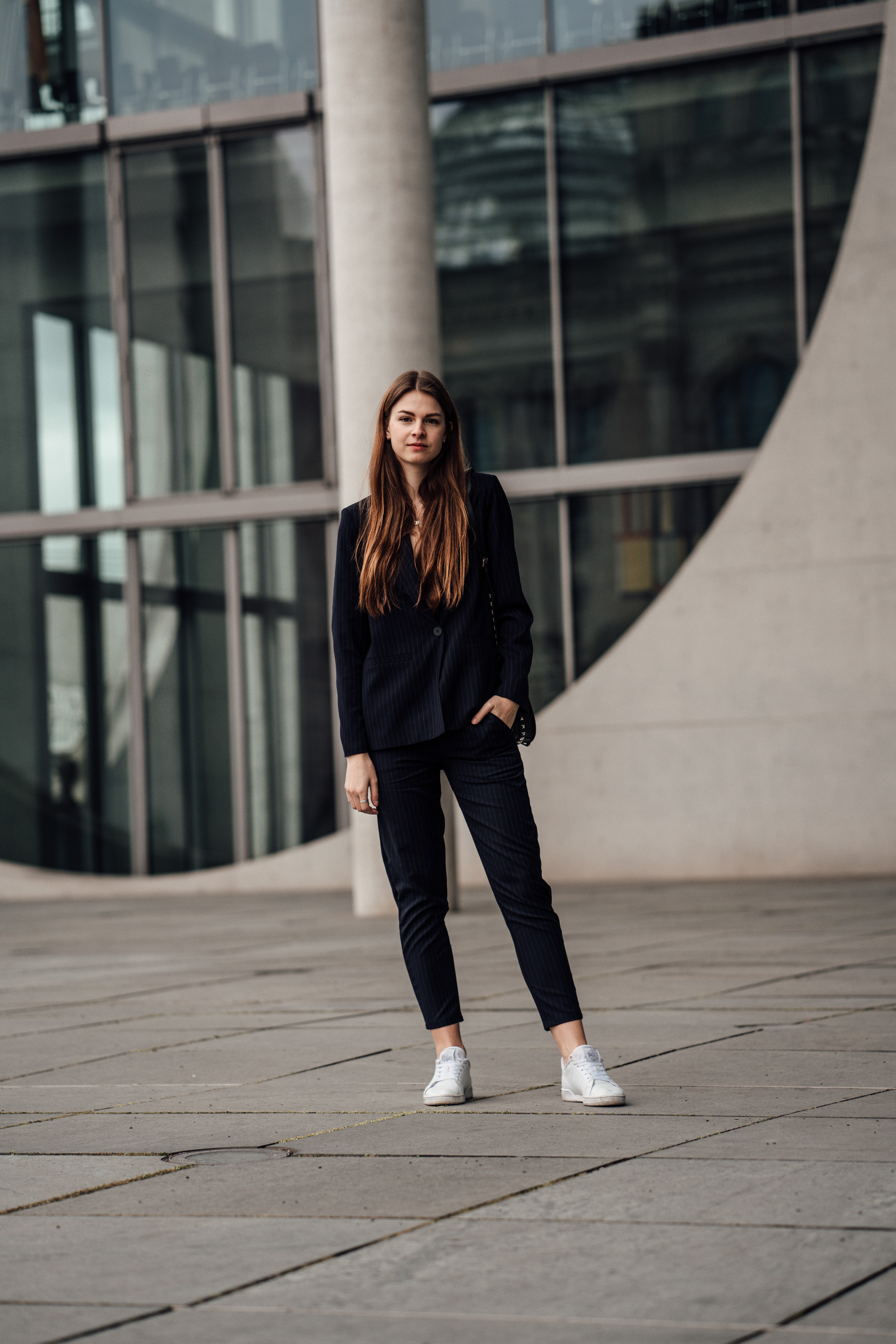 Casual Chic Outfit: Women's suit combined with sneakers