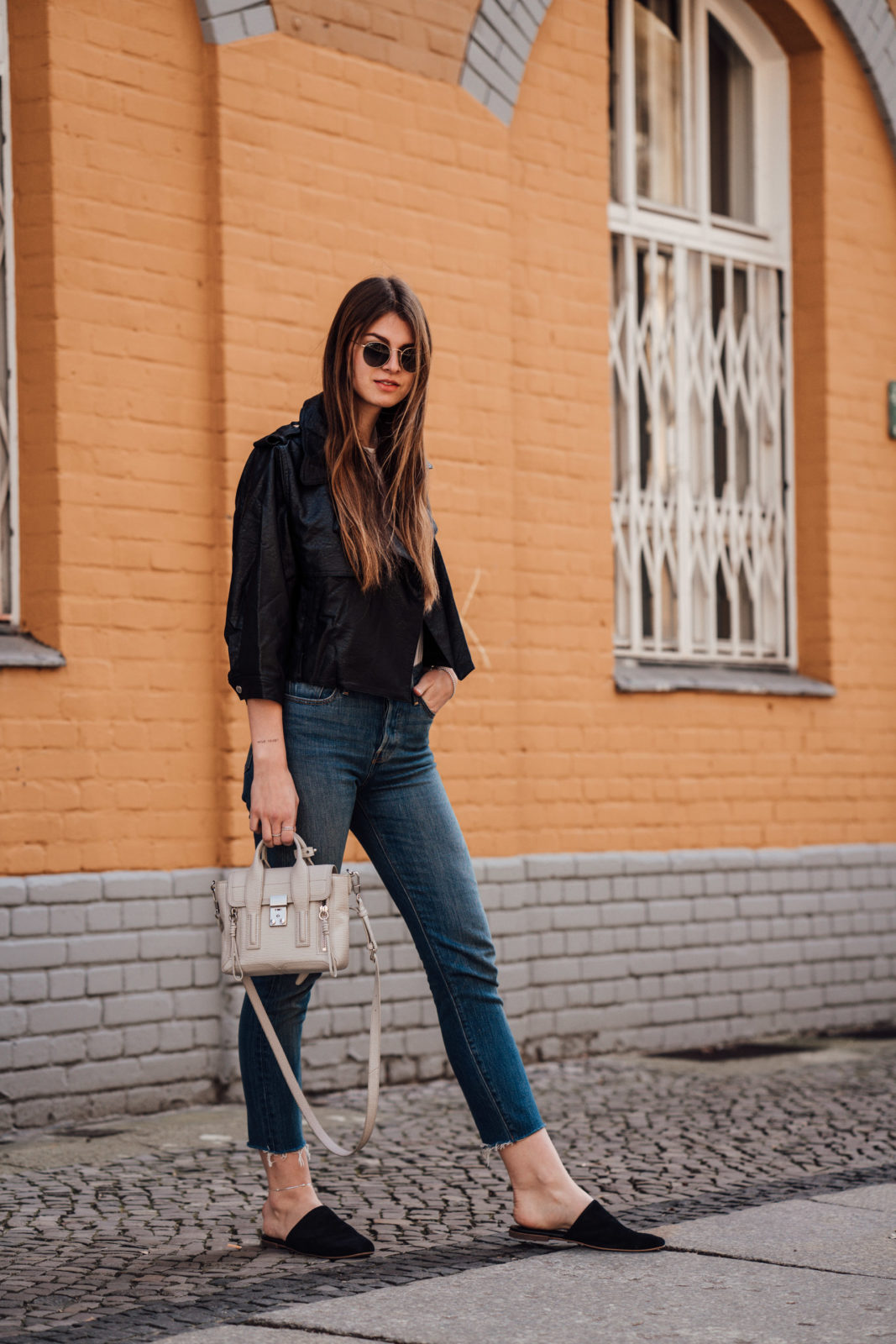 Casual Spring Outfit Leather Jacket combined with Mom Jeans