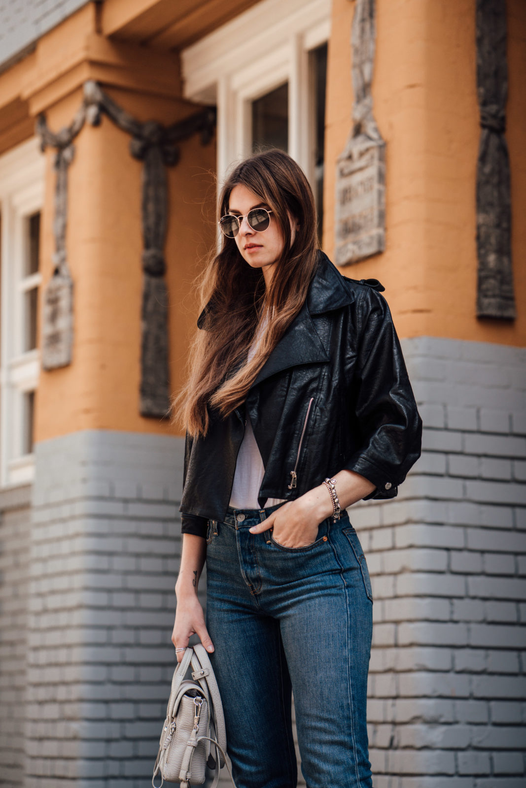 Casual Spring Outfit Leather Jacket combined with Mom Jeans