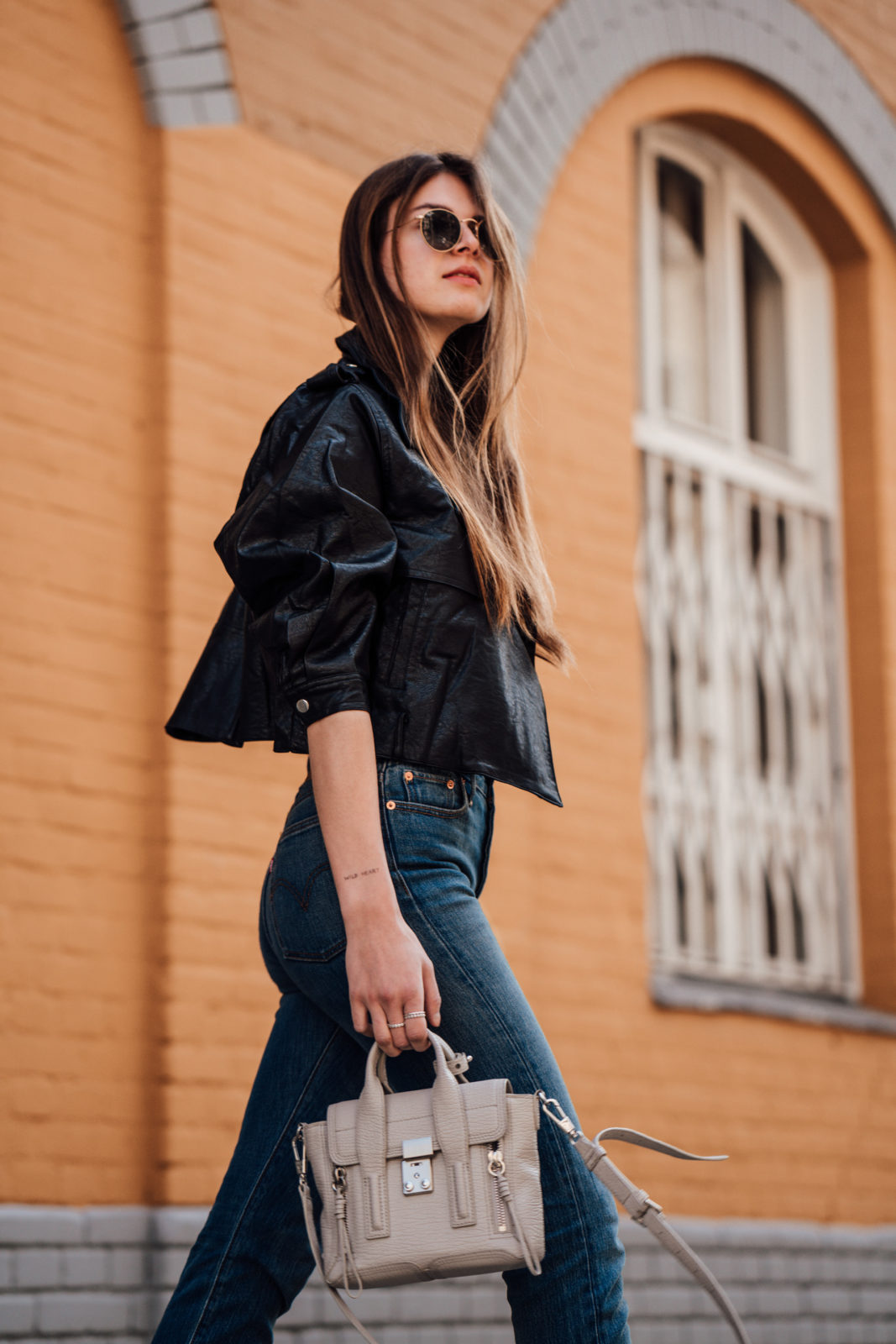 Casual Spring Outfit Leather Jacket combined with Mom Jeans