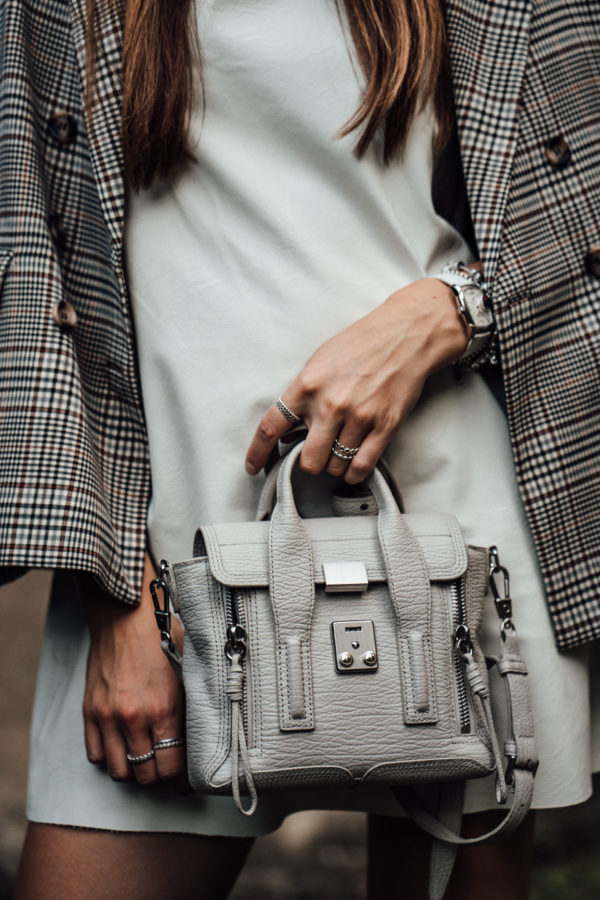 grey cross-body bag