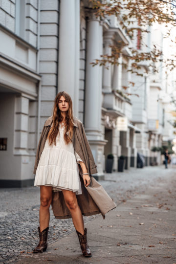 wearing a white dress in autumn