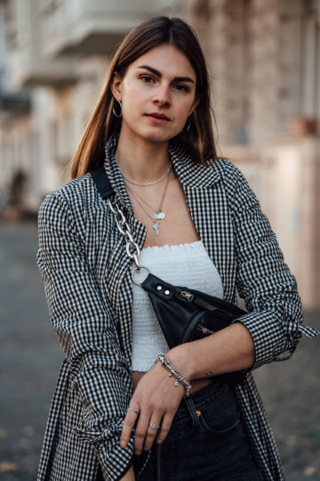 Combining white Dr. Martens with a trench coat