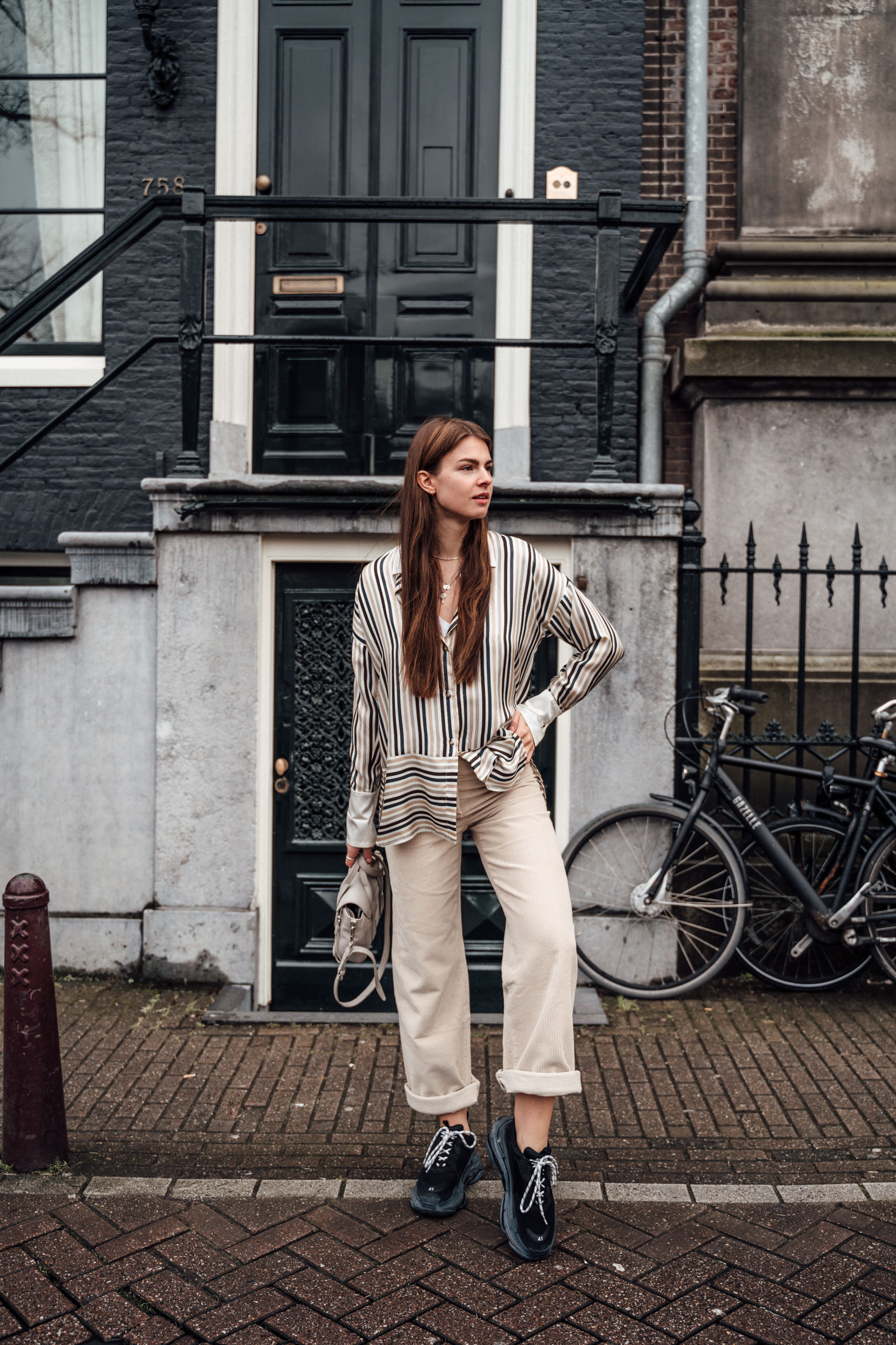 Amsterdam Travel Outfit: Corduroy Pants and Striped Blouse
