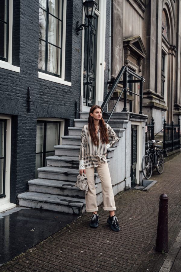 Amsterdam Travel Outfit: Corduroy Pants and Striped Blouse