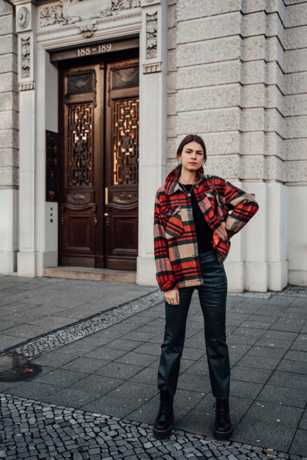 lumber jacket and leather pants combination