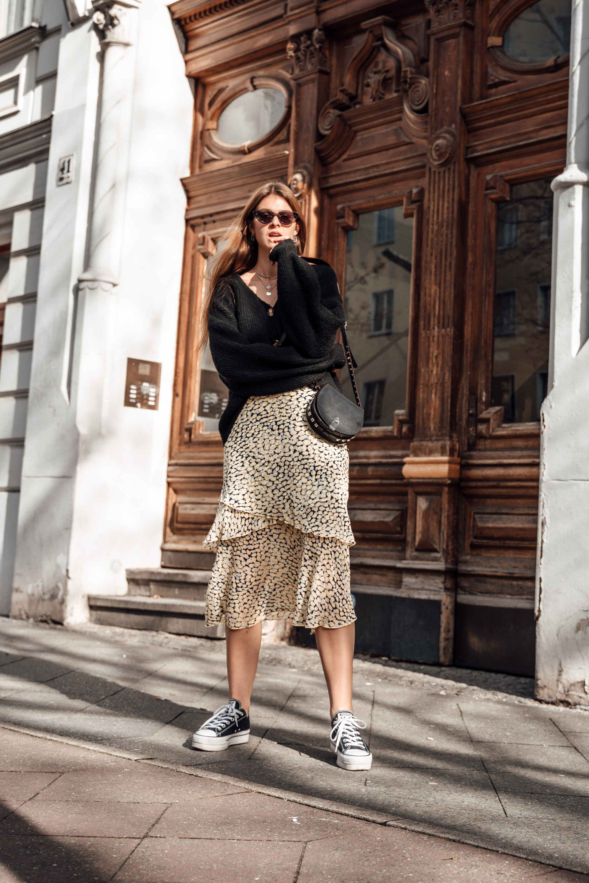 How to Style A Pleated Midi Skirt with Sneakers | Casual skirt outfits,  Pleated midi skirt, Midi skirt casual