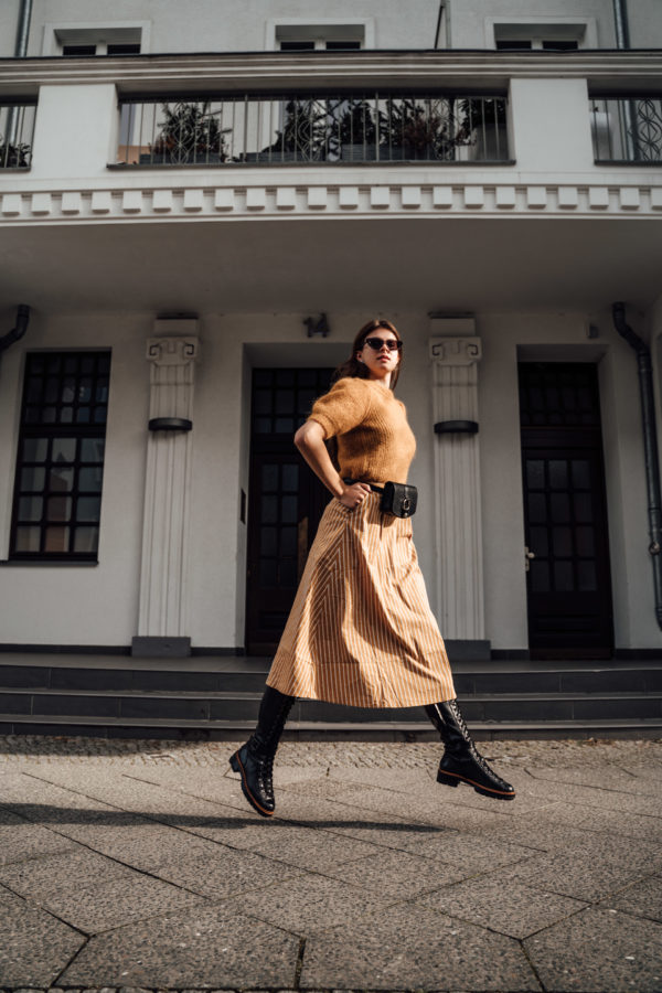 skirt combined with knee high boots